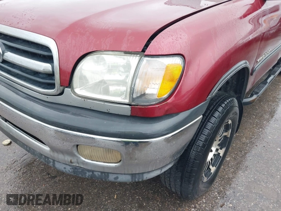 2002 Toyota Tundra SR5 with VIN 5TBRN34112S231284, listed as a IAAI auction lot 41886121 with 364,985 mi miles and . Bid and sale history available at DreamBid. Image 6.