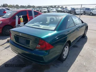 2001 Honda Civic LX with VIN 1HGEM21551L111533, listed as a IAAI auction lot 41801139 with 253,497 mi miles. Bid and sale history available at carsss.com. Image 4.