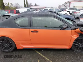 2015 Scion tC with VIN JTKJF5C79FJ007842, listed as a IAAI auction lot 41560881 with 155,436 mi miles. Bid and sale history available at carsss.com. Image 13.