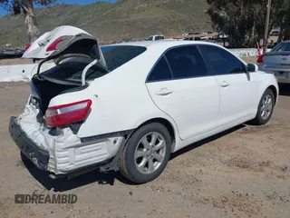 2009 Toyota Camry with VIN 4T1BE46K19U851560, listed as a IAAI auction lot 41812628 with 244,313 mi miles. Bid and sale history available at carsss.com. Image 4.