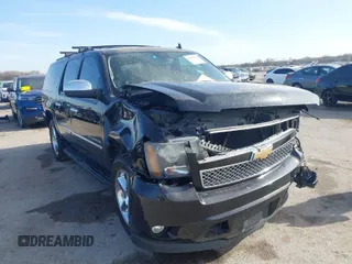 2011 Chevrolet Suburban LTZ with VIN 1GNSCKE03BR117338, listed as a IAAI auction lot 41878479 with 182,327 mi miles. Bid and sale history available at carsss.com. Image 1.
