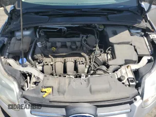 2012 Ford Focus SE z VIN 1FAHP3K2XCL270196, wystawiony jako Copart lot #57319575 z przebiegiem 80 364 mil mil oraz Szkoda całkowita • Salvage title. Historia ofert i sprzedaży dostępna na DreamBid. Obrazek 11.