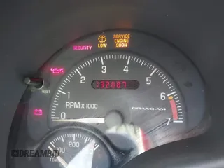 2000 Pontiac Grand Am SE1 with VIN 1G2NF52T0YM808611, listed as a IAAI auction lot 41943125 with 132,887 mi miles. Bid and sale history available at carsss.com. Image 7.