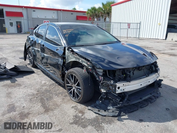 2023 Toyota Camry SE with VIN 4T1G11AK6PU741172, listed as a IAAI auction lot 41599909 with 56,668 mi miles and . Bid and sale history available at DreamBid. Image 1.