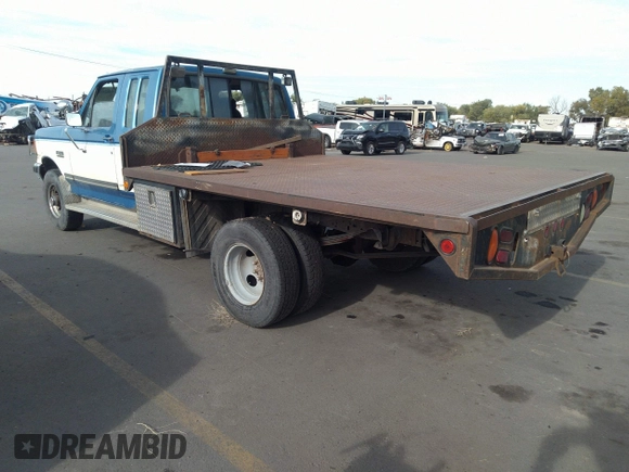 1990 Ford F-250 with VIN 1FTHX26G2LKA30043, listed as a IAAI auction lot 34569128 with 31,439 mi miles and . Bid and sale history available at DreamBid. Image 3.