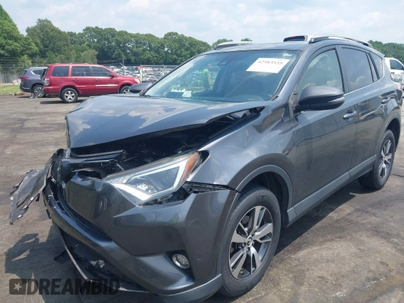 2018 Toyota RAV4 XLE with VIN JTMWFREV7JD111785, listed as a IAAI auction lot 42583535 with 110,724 mi miles and . Bid and sale history available at DreamBid. Image 2.