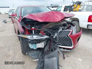 2022 Lexus RX 350 with VIN 2T2HZMAA0NC256932, listed as a IAAI auction lot 42179918 with 24,790 mi miles and . Bid and sale history available at DreamBid. Image 6.