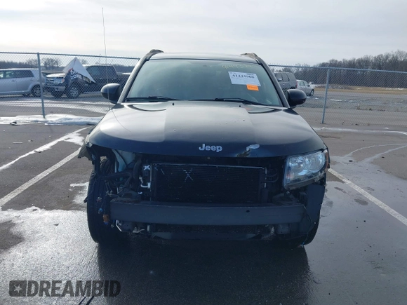 2016 Jeep Compass Latitude with VIN 1C4NJCEA5GD803959, listed as a IAAI auction lot 41443900 with 97,916 mi miles and . Bid and sale history available at DreamBid. Image 13.