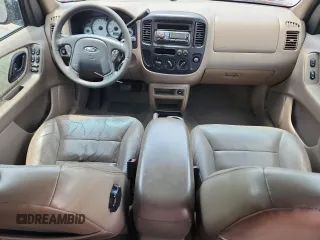2002 Ford Escape XLT Choice with VIN 1FMYU03132KA78142, listed as a Copart auction lot 65527755 with 149,326 mi miles and Salvage title. Bid and sale history available at DreamBid. Image 8.