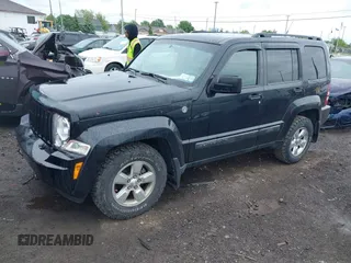 2011 Jeep Liberty Sport Jet with VIN 1J4PN2GK0BW527615, listed as a IAAI auction lot 42318092 with 150,043 mi miles and . Bid and sale history available at DreamBid. Image 2.