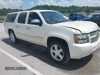 2009 Chevrolet Suburban LTZ with VIN 1GNFC36J79R292877, listed as a IAAI auction lot 42577573 with 209,101 mi miles and . Bid and sale history available at DreamBid. Image 1.