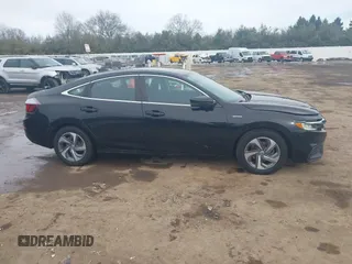 2020 Honda Insight EX with VIN 19XZE4F53LE000119, listed as a IAAI auction lot 41653671 with 122,819 mi miles and . Bid and sale history available at DreamBid. Image 13.