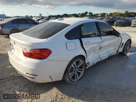 2015 BMW 4 Series 428i with VIN WBA4A5C50FG052177, listed as a Copart auction lot 86093994 with 127,956 mi miles and Salvage Title. Bid and sale history available at DreamBid. Image 3.