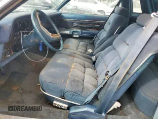 1977 Ford Thunderbird z VIN 7G87S303225, wystawiony jako Copart lot #74216404 z przebiegiem 48 305 mil mil oraz Szkody całkowita. Historia ofert i sprzedaży dostępna na DreamBid. Obrazek 7.
