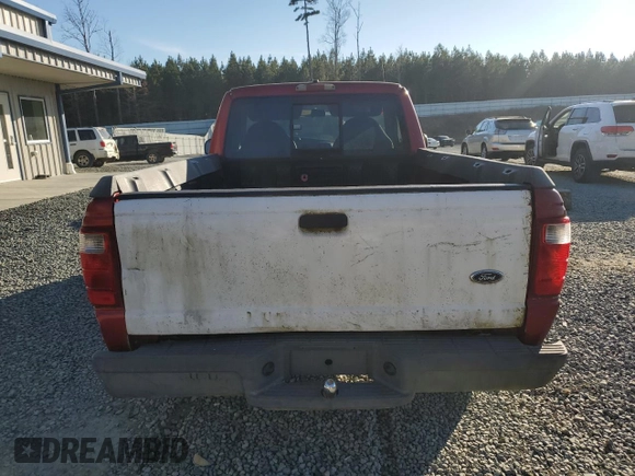2001 Ford Ranger XL with VIN 1FTYR10C91TA26959, listed as a Copart auction lot 86453044 with 303,676 mi miles and Salvage title. Bid and sale history available at DreamBid. Image 6.