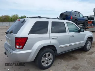2005 Jeep Grand Cherokee Limited with VIN 1J4HR58255C671885, listed as a IAAI auction lot 42136640 with 215,751 mi miles. Bid and sale history available at carsss.com. Image 4.