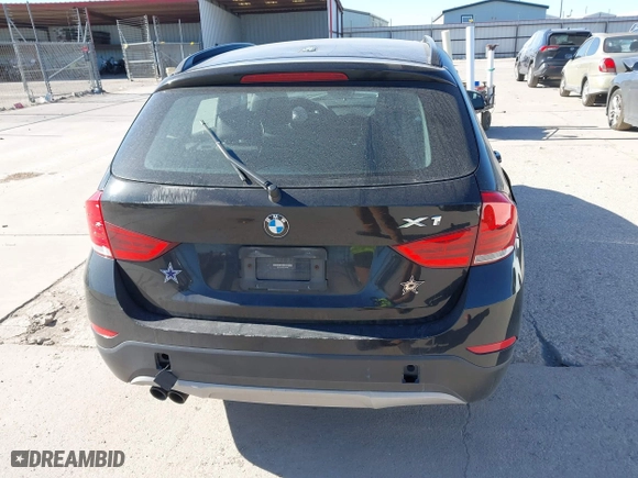 2015 BMW X1 sDrive28i with VIN WBAVM1C58FV498559, listed as a IAAI auction lot 41208638 with 100,452 mi miles. Bid and sale history available at carsss.com. Image 16.
