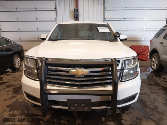 2020 Chevrolet Tahoe Commercial with VIN 1GNSKDECXLR260202, listed as a IAAI auction lot 41608712 with 137,214 mi miles. Bid and sale history available at carsss.com. Image 6.