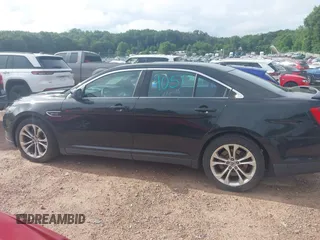 2013 Ford Taurus SHO z VIN 1FAHP2KT8DG155996, wystawiony jako IAAI lot #42709051 z przebiegiem 162 956 mil mil oraz . Historia ofert i sprzedaży dostępna na DreamBid. Obrazek 13.