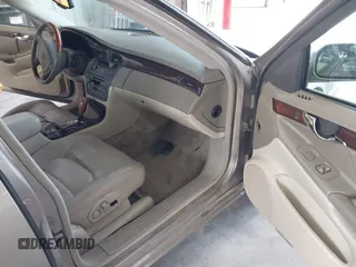 2001 Cadillac DeVille DTS with VIN 1G6KF57911U263913, listed as a IAAI auction lot 41744490 with 100,235 mi miles. Bid and sale history available at carsss.com. Image 5.