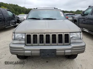 1997 Jeep Grand Cherokee Limited with VIN 1J4GZ78Y0VC599554, listed as a Copart auction lot 72006854 with 321,283 mi miles and Salvage Title. Bid and sale history available at carsss.com. Image 5.