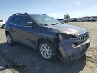 2014 Jeep Cherokee Latitude with VIN 1C4PJLCB2EW245753, listed as a Copart auction lot 49452985 with 106,240 mi miles and Salvage Title. Bid and sale history available at carsss.com. Image 4.