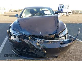 2024 Tesla Model 3 with VIN 5YJ3E1EA7RF853483, listed as a IAAI auction lot 40863575 with 1,173 mi miles and . Bid and sale history available at carsss.com. Image 6.