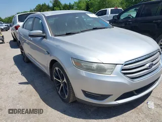 2014 Ford Taurus SEL z VIN 1FAHP2E88EG131304, wystawiony jako IAAI lot #42193759 z przebiegiem 174 465 mil mil oraz . Historia ofert i sprzedaży dostępna na DreamBid. Obrazek 1.