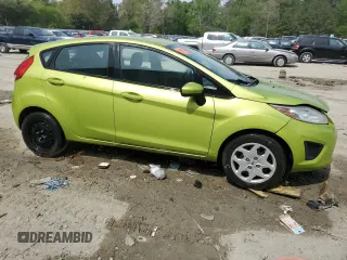 2012 Ford Fiesta SE z VIN 3FADP4EJ0CM182022, wystawiony jako Copart lot #54709245 z przebiegiem 136 266 mil mil oraz Tytuł czysty. Historia ofert i sprzedaży dostępna na DreamBid. Obrazek 4.