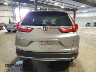 2018 Honda CR-V Touring z VIN 7FARW2H95JE012947, wystawiony jako Copart lot #64779925 z przebiegiem 20 561 mil mil oraz Szkoda całkowita • Salvage title. Historia ofert i sprzedaży dostępna na DreamBid. Obrazek 6.