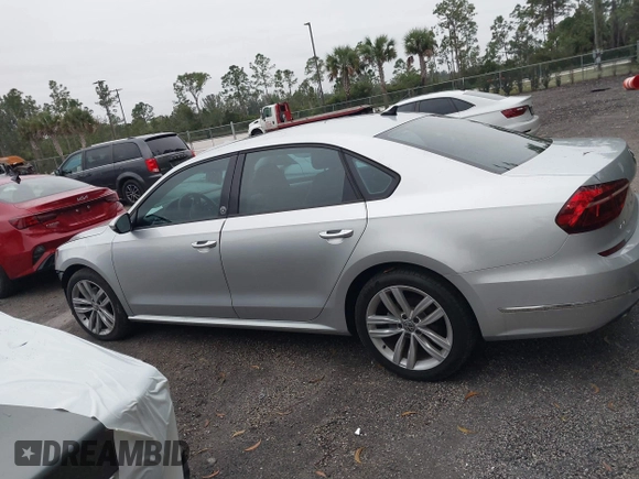 2019 Volkswagen Passat 2.0T Wolfsburg Edition with VIN 1VWLA7A3XKC007385, listed as a IAAI auction lot 41409014 with 36,208 mi miles. Bid and sale history available at carsss.com. Image 14.