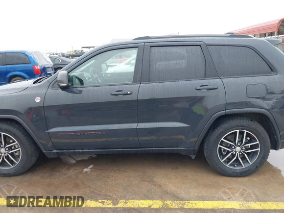2018 Jeep Grand Cherokee Trailhawk with VIN 1C4RJFLG6JC320763, listed as a IAAI auction lot 41871683 with 115,417 mi miles and . Bid and sale history available at DreamBid. Image 14.