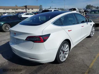 2018 Tesla Model 3 Long Range Battery with VIN 5YJ3E1EA0JF008351, listed as a IAAI auction lot 41129459 with 36,518 mi miles. Bid and sale history available at carsss.com. Image 4.