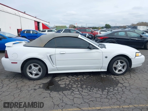 2004 Ford Mustang Deluxe with VIN 1FAFP446X4F134860, listed as a IAAI auction lot 41755643 with 174,410 mi miles. Bid and sale history available at carsss.com. Image 13.