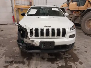 2014 Jeep Cherokee Latitude with VIN 1C4PJMCS4EW318353, listed as a IAAI auction lot 41945598 with 179,425 mi miles and . Bid and sale history available at DreamBid. Image 6.