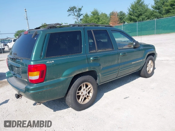 1999 Jeep Grand Cherokee Limited z VIN 1J4GW68N5XC630910, wystawiony jako IAAI lot #42380978 z przebiegiem 188 300 mil mil oraz . Historia ofert i sprzedaży dostępna na DreamBid. Obrazek 4.