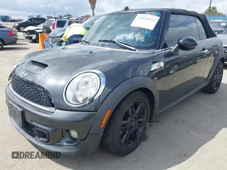 2012 MINI Convertible S with VIN WMWZP3C54CT250689, listed as a IAAI auction lot 41928624 with 126,442 mi miles and . Bid and sale history available at DreamBid. Image 2.