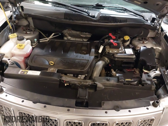 2016 Jeep Compass Latitude with VIN 1C4NJDEB4GD631759, listed as a IAAI auction lot 42193660 with 100,659 mi miles and . Bid and sale history available at DreamBid. Image 10.
