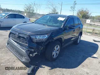 2021 Toyota RAV4 XLE with VIN 2T3W1RFV2MW107986, listed as a IAAI auction lot 41835348 with 103,450 mi miles. Bid and sale history available at carsss.com. Image 2.
