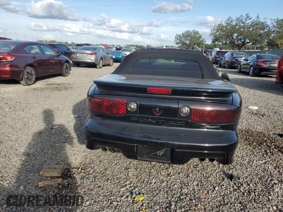 1999 Pontiac Firebird Trans Am with VIN 2G2FV32G1X2217352, listed as a Copart auction lot 79941714 with 174,580 mi miles and Salvage title. Bid and sale history available at DreamBid. Image 6.
