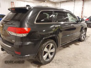 2015 Jeep Grand Cherokee Overland with VIN 1C4RJFCT7FC612930, listed as a IAAI auction lot 41485240 with 189,564 mi miles. Bid and sale history available at carsss.com. Image 4.
