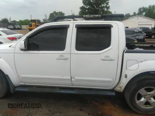 2006 Nissan Frontier SE with VIN 1N6AD07U66C441928, listed as a IAAI auction lot 42093470 with 271,935 mi miles and . Bid and sale history available at DreamBid. Image 14.
