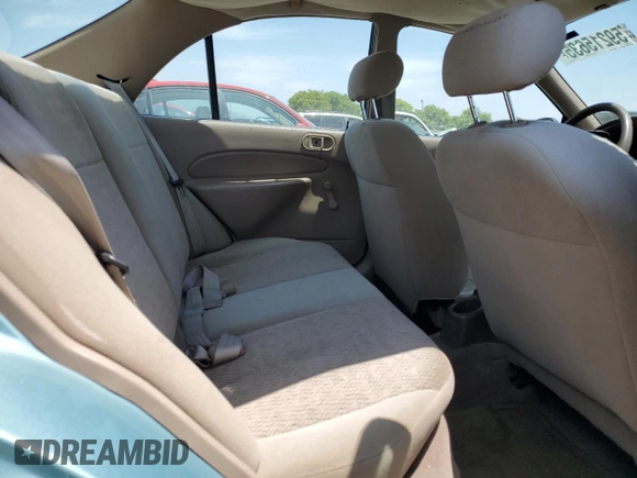 1999 Ford Escort LX with VIN 1FAFP10P6XW196483, listed as a Copart auction lot 59215635 with 74,859 mi miles and Salvage title. Bid and sale history available at DreamBid. Image 10.