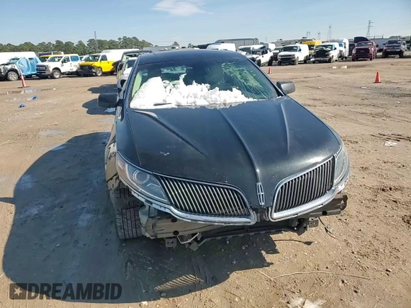 2014 Lincoln MKS z VIN 1LNHL9DK3EG606655, wystawiony jako Copart lot #42008655 z przebiegiem 100 886 mil mil oraz Szkoda całkowita • Salvage title. Historia ofert i sprzedaży dostępna na DreamBid. Obrazek 11.