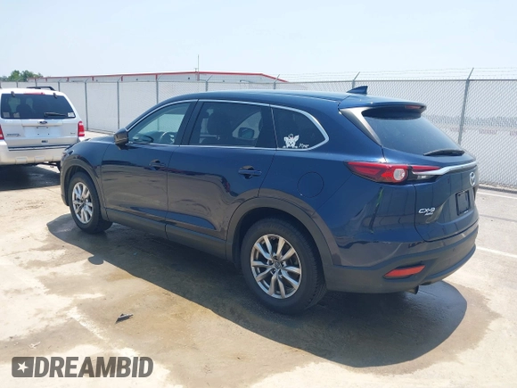 2018 Mazda CX-9 Touring with VIN JM3TCBCY3J0220372, listed as a IAAI auction lot 42405192 with 104,556 mi miles and . Bid and sale history available at DreamBid. Image 3.