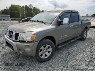 2006 Nissan Titan LE z VIN 1N6BA07B06N528725, wystawiony jako Copart lot #53093995 z przebiegiem 240 230 mil mil oraz Szkody całkowita. Historia ofert i sprzedaży dostępna na DreamBid. Obrazek 1.