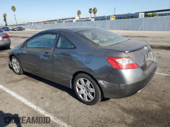 2010 Honda Civic Cpe LX with VIN 2HGFG1B61AH529839, listed as a Copart auction lot 69501724 with 218,443 mi miles and Salvage Title. Bid and sale history available at carsss.com. Image 2.