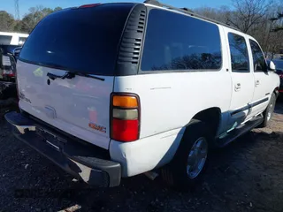 2004 GMC Yukon XL SLT with VIN 3GKEC16Z34G260469, listed as a IAAI auction lot 41557188 with 203,233 mi miles. Bid and sale history available at carsss.com. Image 4.