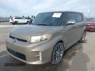 2014 Scion xB with VIN JTLZE4FE7EJ065646, listed as a IAAI auction lot 41681896 with 149,534 mi miles. Bid and sale history available at carsss.com. Image 2.