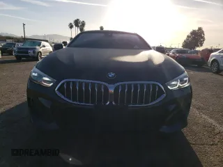 2020 BMW 8 Series 840i with VIN WBAGV4C06LCE28998, listed as a Copart auction lot 48566634 with 54,946 mi miles and Salvage title. Bid and sale history available at DreamBid. Image 5.